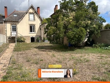 Maison de ville 3 chambres avec grand garage, jardin et sous-sol