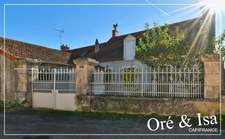 Maison de plain-pied type loft avec jardin paysagé, garage et fort potentiel – Culan