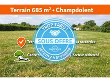 Terrain 685 m² – Champdolent – Environnement calme