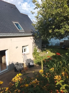 Maison chaleureuse de 98.74 M2 dotée de 4 chambres  avec terrain arboré et structuré avec terrasse exposition Sud-Ouest