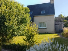 Maison chaleureuse de 98.74 M2 dotée de 4 chambres  avec terrain arboré et structuré avec terrasse exposition Sud-Ouest