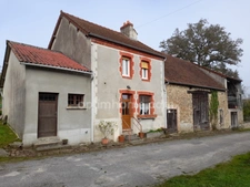 Maison ancienne avec sa grange attenante