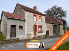 Maison ancienne avec sa grange attenante