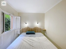 Appartement en Rez-de-jardin entièrement rénové vue LAC , 2 chambres , Climatisé avec Place de Parking 
