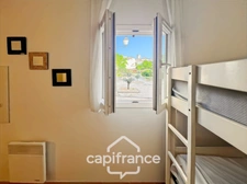 appartement REZ de JARDIN,résidence du lac, 31 m2, chambre ouverte, grande salle de douche, rangements, cave collective. 