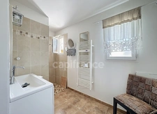 Maison avec garage et jardin - Beauvoisin