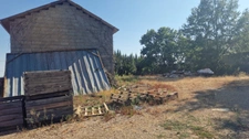 Bâtiments agricole avec studio à rénover - 19 hectares