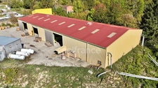 BÂTIMENTS INDUSTRIELS DE 1 815 M², TERRAIN DE 10 353 M², BUREAU DE 40 M², FIBRE OPTIQUE, 2 ACCÈS POIDS LOURDS, RÉSERVE INCENDIE DE 300 M³, TRANSFORMATEUR PRIVÉ 380 V