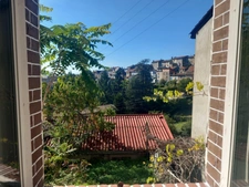 Ensemble immobilier à rénover comprenant maison de ville, appartement et 2 anciens ateliers de coutellerie