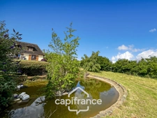 Pavillon de 126 m² avec terrain de 5 240,00 m² , sous-sol complet.