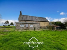 Country house of 133 m², 4 bedrooms with outbuildings, land and woods