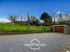 Country house of 133 m², 4 bedrooms with outbuildings, land and woods