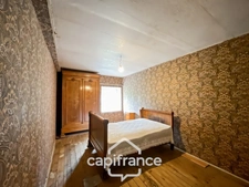 Country house of 133 m², 4 bedrooms with outbuildings, land and woods
