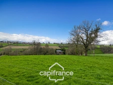 Country house of 133 m², 4 bedrooms with outbuildings, land and woods