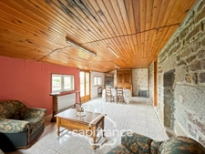 Country house of 133 m², 4 bedrooms with outbuildings, land and woods