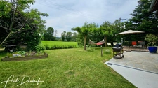 Maison familiale 4 chambres avec jardin, garage, abris voitures et annexes