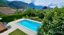 Maison 4 chambres avec terrasse, piscine, jardin arboré, garage, atelier