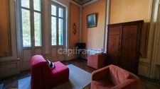 Appartement T2 de caractère en RDC surélevé – Villa bourgeoise néo-renaissance avec parking – Proche plage et commerces