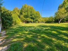 Maison sur 2 niveaux sur grand terrain