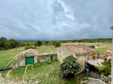  For sale: Renovated stone building with 235 m² of living space and outbuildings of 300 m² - Land of 100,000 m² 
