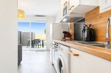 Maison 56 M2 divisée en 2 appartements avec terrasse et parking à BALARUC LES BAINS (34)