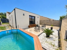 Villa moderne 98m2 de plain-pied avec piscine et jardin à MONTAGNAC (34)