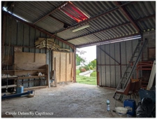 Hangar à aménager en habitation – 150 m² – Terrain 1192 m² – Proche Chemin de Compostelle