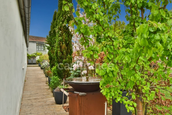 Maison individuelle de type loft dans un secteur prisé