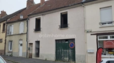 MONTMIRAIL - Centre ville - Maison de 5 pièces avec un grand garage à rénover