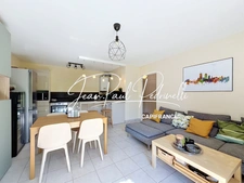 Tassin-la-Demi-Lune - Appartement 2 pièces de 48 m² avec balcon, parking privatif et cave - résidence sécurisée récente