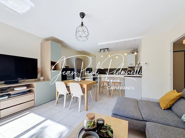 Tassin-la-Demi-Lune - Appartement 2 pièces de 48 m² avec balcon, parking privatif et cave - résidence sécurisée récente