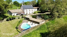 Propriété de charme à la campagne – 305 m² habitables sur 4,8 hectares avec piscine et dépendances