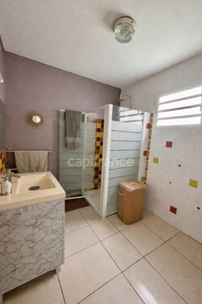 En exclusivité chez Capifrance - Maison familiale plain-pied - 4 chambres - Bras Panon proche centre