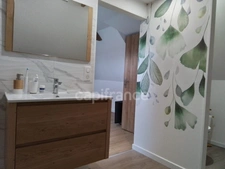 Maison rénovée de 114 m² – 3 chambres dont une suite parentale – Terrain clos – Garage – Sous‑sol complet – À 10 min à pied du bourg