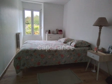 Maison rénovée de 114 m² – 3 chambres dont une suite parentale – Terrain clos – Garage – Sous‑sol complet – À 10 min à pied du bourg