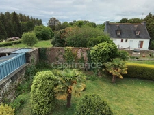 Maison rénovée de 114 m² – 3 chambres dont une suite parentale – Terrain clos – Garage – Sous‑sol complet – À 10 min à pied du bourg