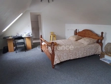 Maison rénovée de 114 m² – 3 chambres dont une suite parentale – Terrain clos – Garage – Sous‑sol complet – À 10 min à pied du bourg