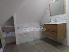 Maison rénovée de 114 m² – 3 chambres dont une suite parentale – Terrain clos – Garage – Sous‑sol complet – À 10 min à pied du bourg