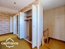 Local d’activité 260 m² + logement 132 m² – parking privé – terrain 1 690 m² – forte visibilité – Thouars (79100)
