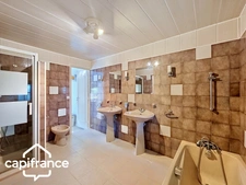 aint-Martin-de-Sanzay (79) – Renovated Stone House – 2,271 sq ft – Single-Level Living – Independent Studio – Outbuildings – 43,000 sq ft Land – Near Thouars and Saumur