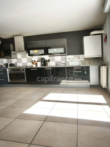Appartement T4 de 84 m² double terrasse, garage et cave 
