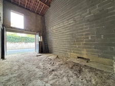 Hautes-Pyrénées (65), for sale in Trie-sur-Baïse: 2 large garages of 71 m² and 82 m² + upper floors on a total plot of 153 m², in the town center, in a quiet location