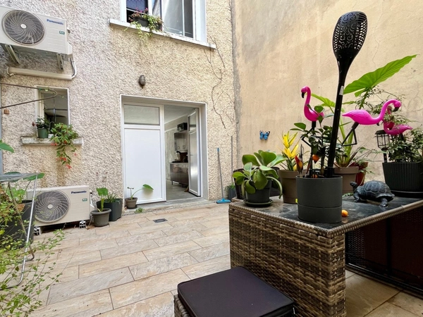 Dpt Hautes Pyrénées (65), à vendre TRIE SUR BAISE Maison T3 de 76 m² habitables avec garage et cour sur 78 m² de terrain, au centre ville