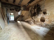 Hautes-Pyrénées (65), for sale in Trie-sur-Baïse: 2 large garages of 71 m² and 82 m² + upper floors on a total plot of 153 m², in the town center, in a quiet location