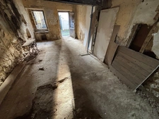Hautes-Pyrénées (65), for sale in Trie-sur-Baïse: 2 large garages of 71 m² and 82 m² + upper floors on a total plot of 153 m², in the town center, in a quiet location