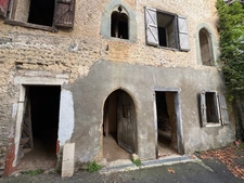 Hautes-Pyrénées (65), for sale in Trie-sur-Baïse: 2 large garages of 71 m² and 82 m² + upper floors on a total plot of 153 m², in the town center, in a quiet location