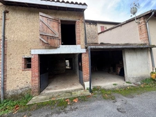 Hautes-Pyrénées (65), for sale in Trie-sur-Baïse: 2 large garages of 71 m² and 82 m² + upper floors on a total plot of 153 m², in the town center, in a quiet location