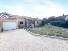 Vente Maison de plain-pied 4 pièces à MANOSQUE (04) - Jardin 740m2, garage, combles aménagés, proche commodités