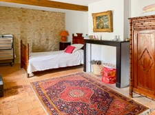 For Sale – Stone village house (6 rooms) of 227 m² in Bazian (Gers) with courtyard and small garden