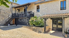 Renovated stone house with vineyard views, in the heart of a charming village